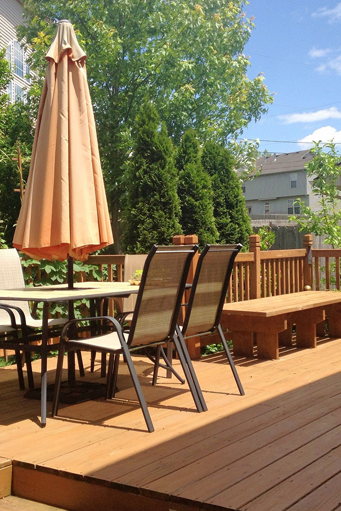 Wooden deck with outdoor seating and table